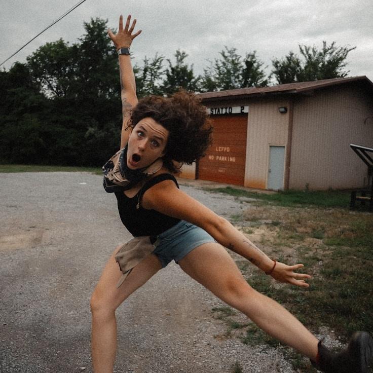 Alex Kim, Lead Design Curator at Continuous Skill Hub, reviewing corporate floral arrangements